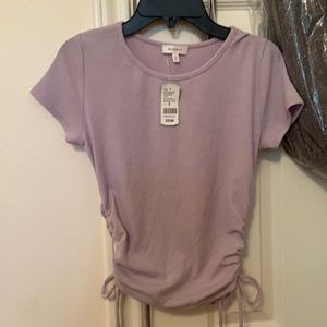 Purple shirt with ties on the side